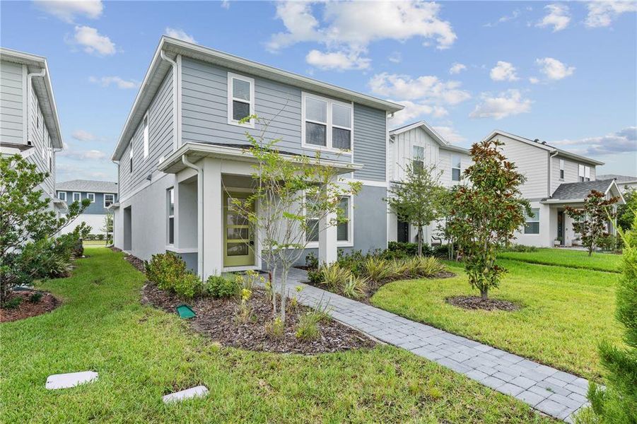 Exterior details and patio area of a home in EverBe, Orlando (Image 22).