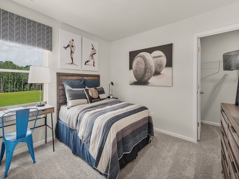 Secondary bedroom in the Taylorsville floorplan at a Meritage Homes community in Wendell, NC.