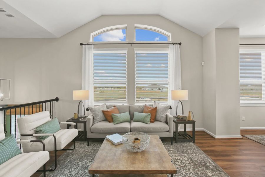 Representative furnished interior of a home built from the Summerhouse 2 by Chesmar Homes in Meridiana Townhomes, Iowa Colony (Image 7).