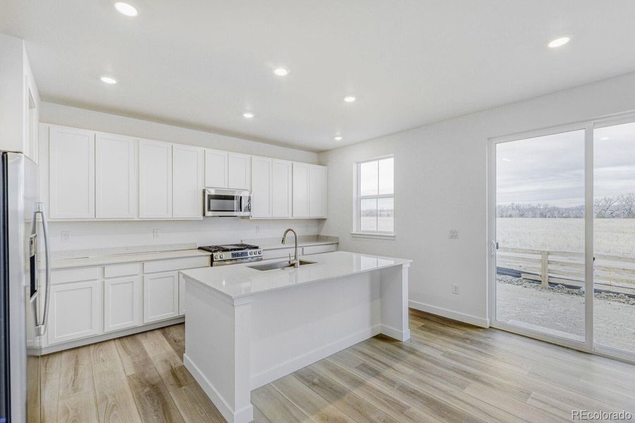 Furnished interior view inside a new home in Vermilion Creek, Centennial (Image 3).