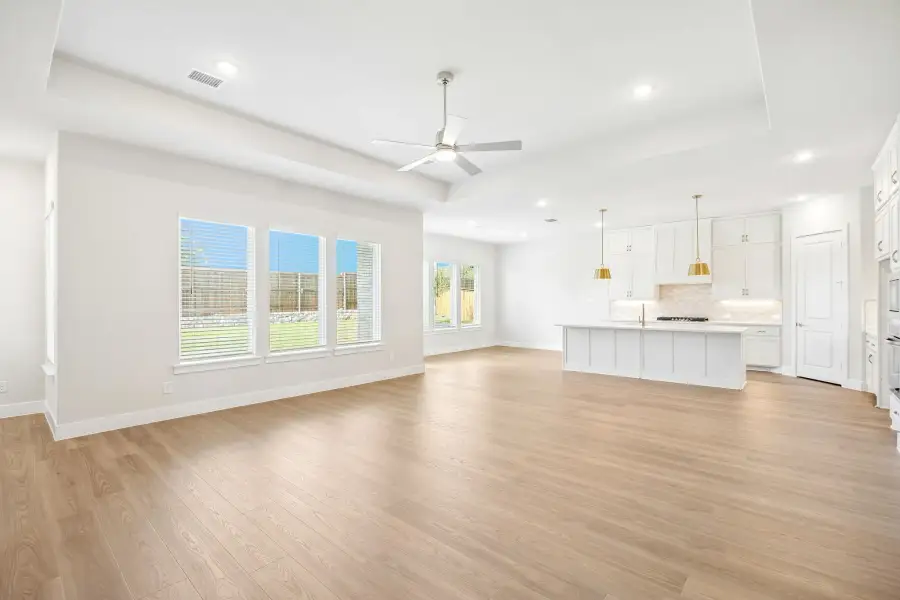 Spacious, unfurnished interior of a new home in Rainwater Crossing, Celina (Image 18).