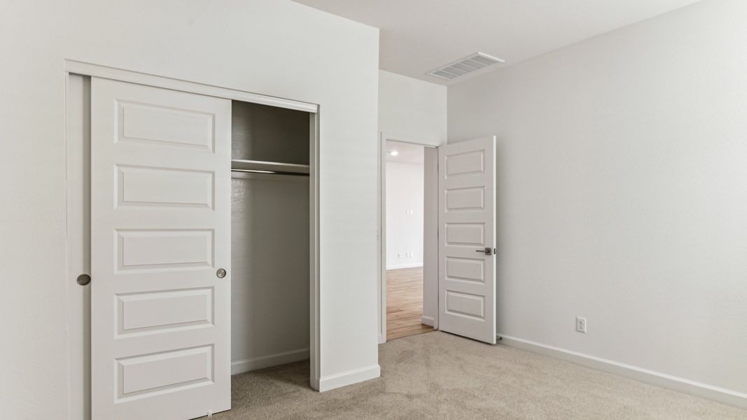 Representative unfurnished interior of a home built from the Cobalt by D.R. Horton in The Ridge at Stone Butte, Phoenix (Image 23).