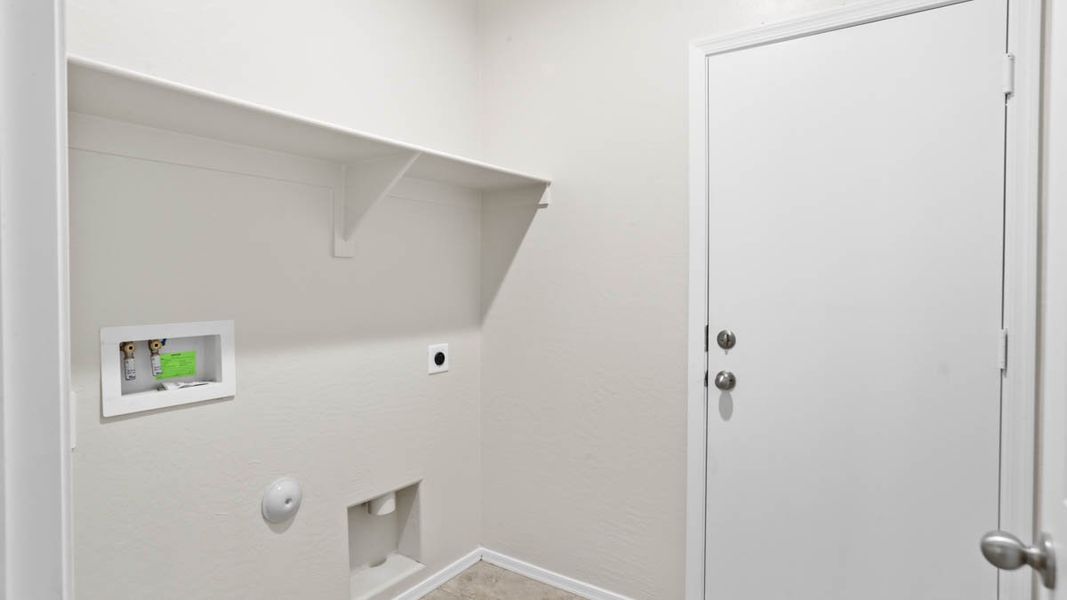 Representative unfurnished interior of a home built from the McCormick by D.R. Horton in Rio Rancho Estates, Surprise (Image 28).