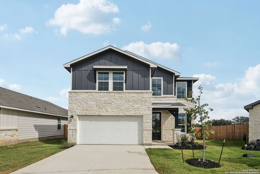 Front exterior of a new home in Estancia Ranch - Premier Series, San Antonio, TX, highlighting curb appeal (Image 22). Front exterior of a new home in Estancia Ranch - Premier Series, San Antonio, TX, highlighting curb appeal (Image 22).
