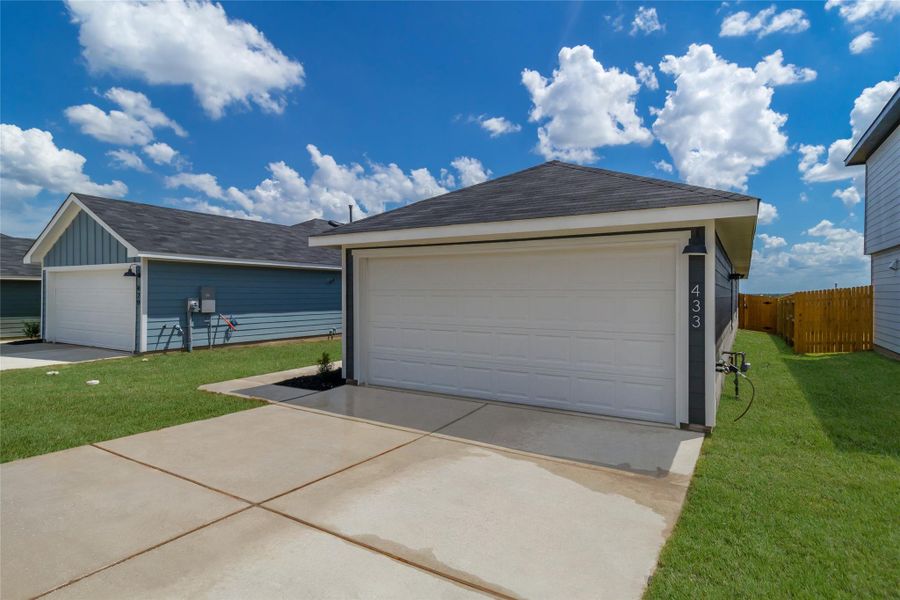 Exterior details and patio area of a home in Prairie Lakes, Buda (Image 2). Exterior details and patio area of a home in Prairie Lakes, Buda (Image 2).