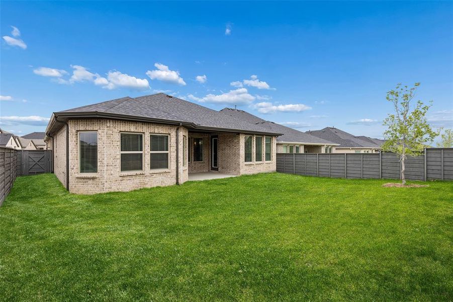 Exterior details and patio area of a home in , Little Elm (Image 3).