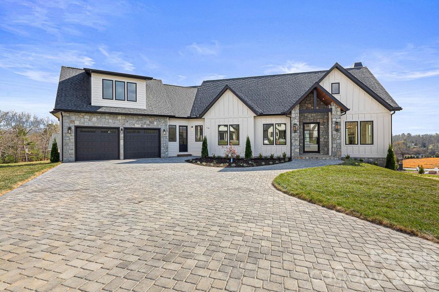 Front exterior of a new home in , Fletcher, NC, highlighting curb appeal (Image 26).