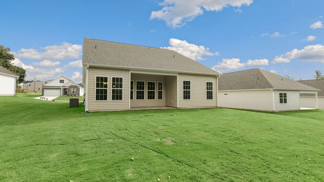 Exterior details and patio area of a home in The Villas at Martin Farms, Aberdeen (Image 19).