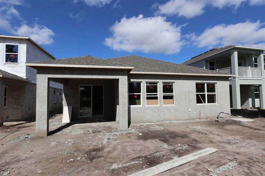 In-progress construction of a new home in Eden at Crossprairie, St. Cloud, FL (Image 12).