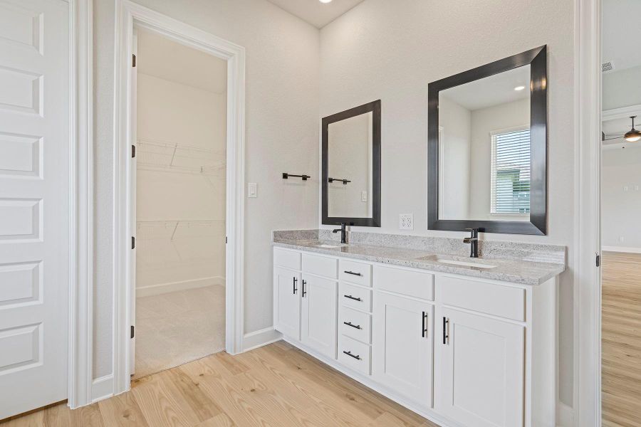 Furnished interior view inside a new home in ShadowGlen, Manor (Image 8). Furnished interior view inside a new home in ShadowGlen, Manor (Image 8).