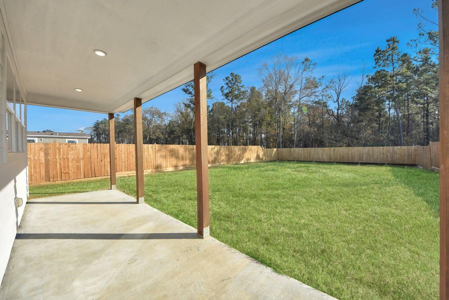 Exterior details and patio area of a home in , Conroe (Image 21).