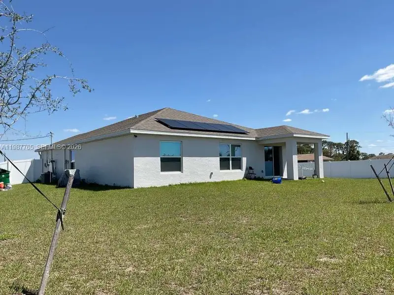 Exterior details and patio area of a home in , Labelle (Image 2). Exterior details and patio area of a home in , Labelle (Image 2).