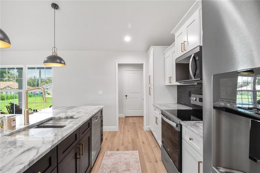 Furnished interior view inside a new home in , Dunnellon (Image 17).
