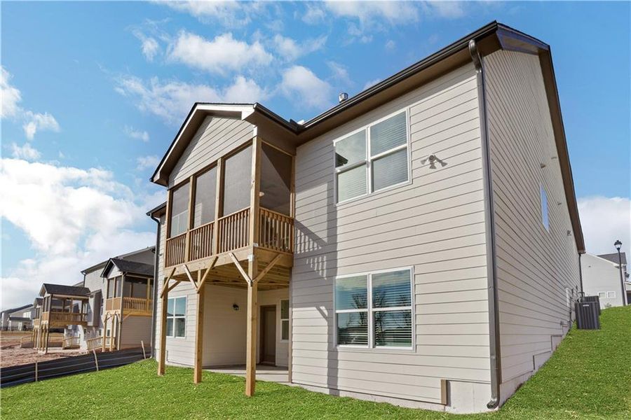 Exterior details and patio area of a home in Twin Lakes, Hoschton (Image 3).