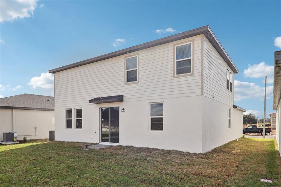 Exterior details and patio area of a home in , Davenport (Image 23).