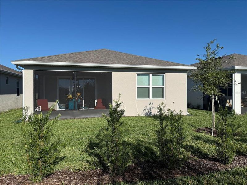 Exterior details and patio area of a home in Del Webb Sunbridge, St. Cloud (Image 1).