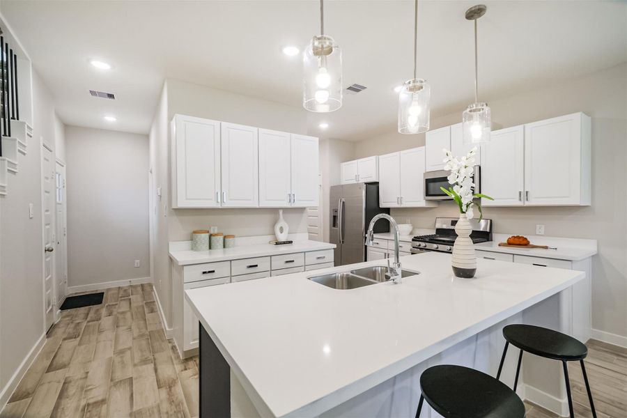 Photos are sample images from a previously built home with the same floor plan. Finishes and fixtures in the current home have been upgraded and may vary.