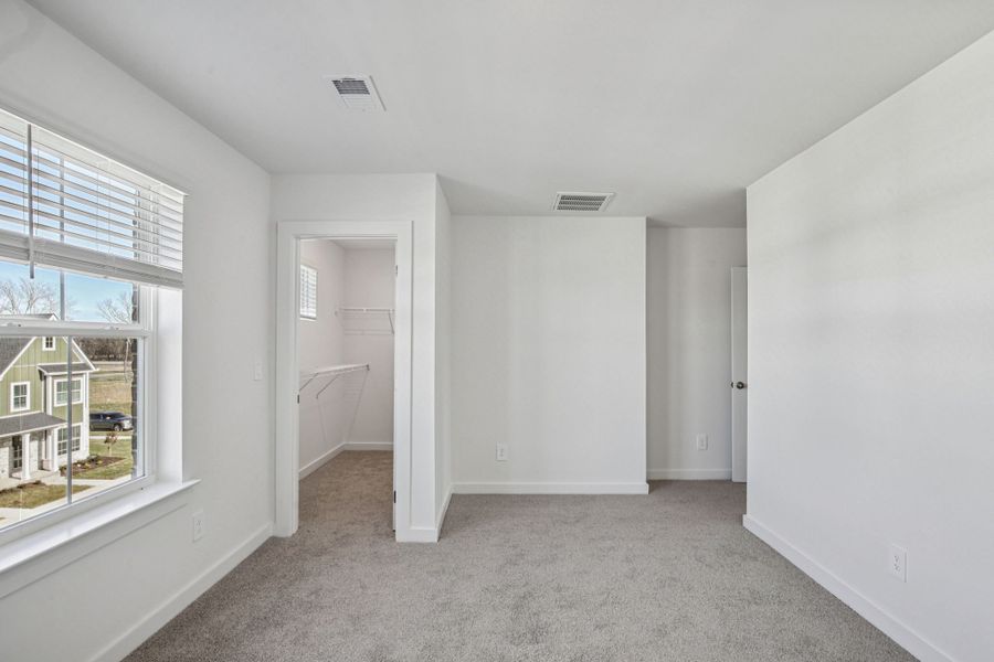 Spacious, unfurnished interior of a new home in Greystone - Highland Townhomes, Smyrna (Image 14).