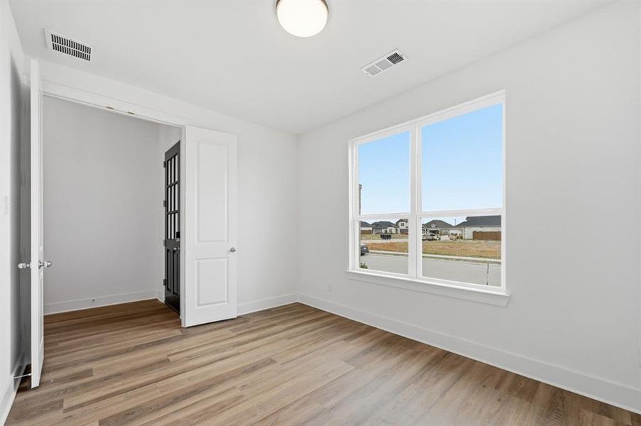 Spacious, unfurnished interior of a new home in Waterscape: 50ft. lots, Royse City (Image 12).