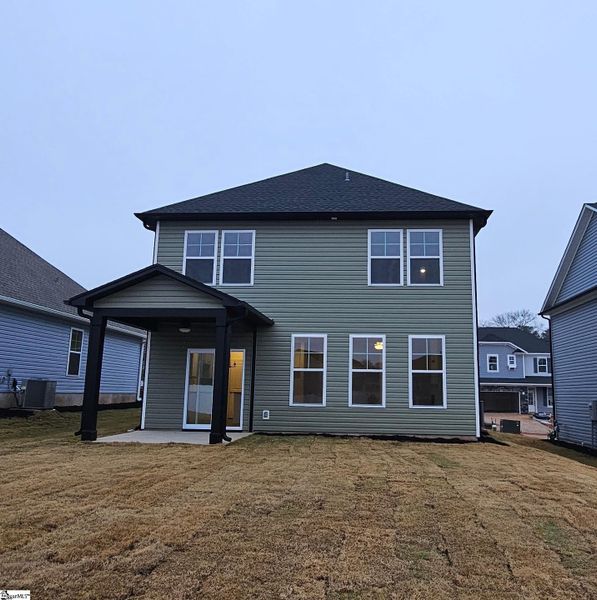 Exterior details and patio area of a home in Sedona, Greenville (Image 3).
