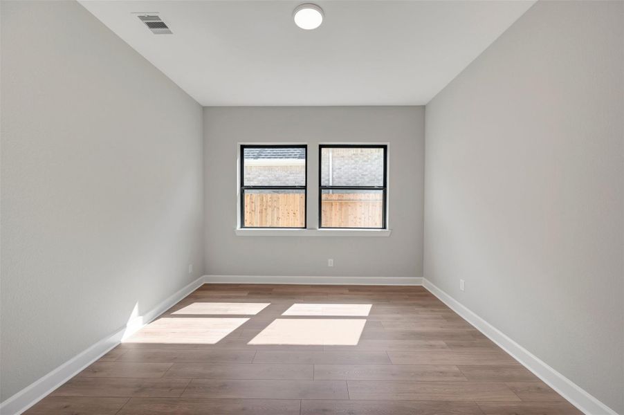 Spacious, unfurnished interior of a new home in The Highlands Encore - Tranquil Collection, Porter (Image 18).