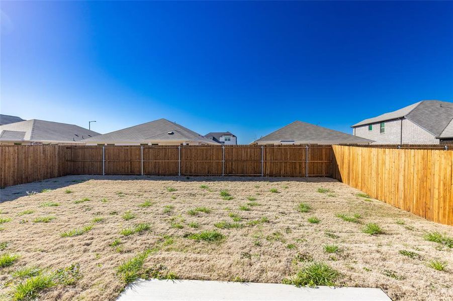 Front exterior of a new home in Stratton Place, Greenville, TX, highlighting curb appeal (Image 2).