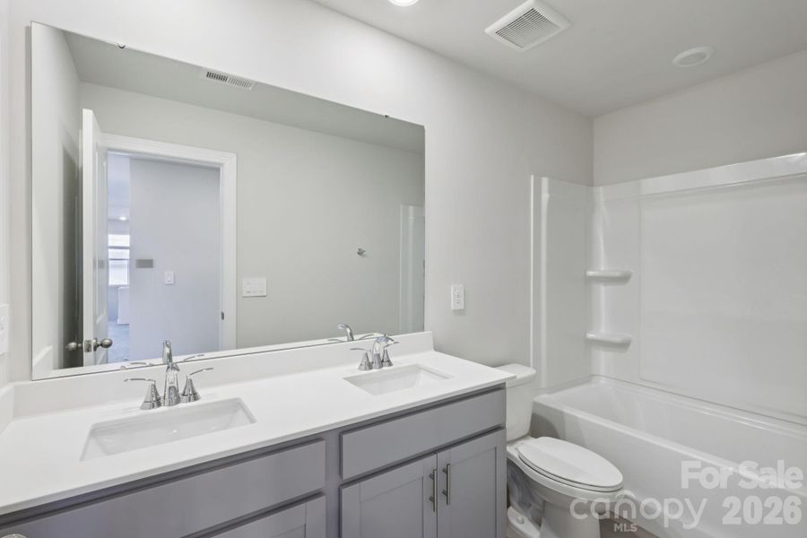 Furnished interior view inside a new home in Harper Landing, Stanley (Image 8).