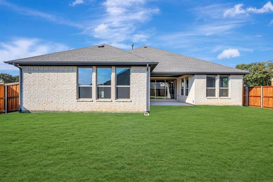 Exterior details and patio area of a home in Sterling Greene, Arlington (Image 2). Exterior details and patio area of a home in Sterling Greene, Arlington (Image 2).