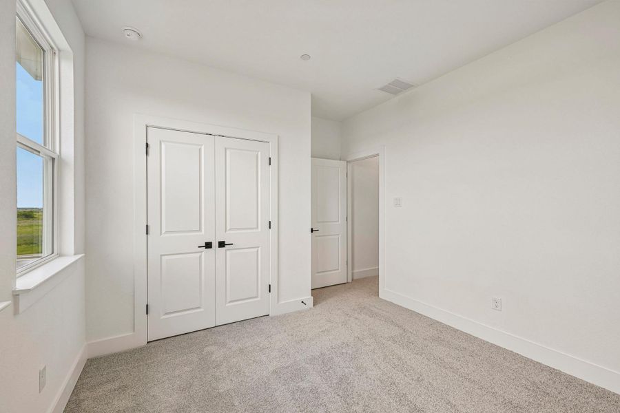 Spacious, unfurnished interior of a new home in Avery Centre, Round Rock (Image 33).