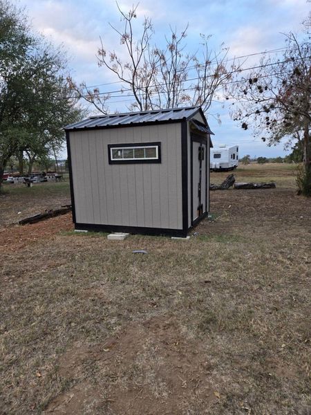 View of outbuilding in back yard