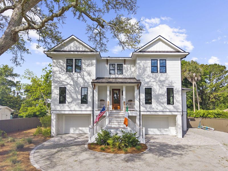 Front exterior of a new home in , Isle Of Palms, SC, highlighting curb appeal (Image 1). Front exterior of a new home in , Isle Of Palms, SC, highlighting curb appeal (Image 1).