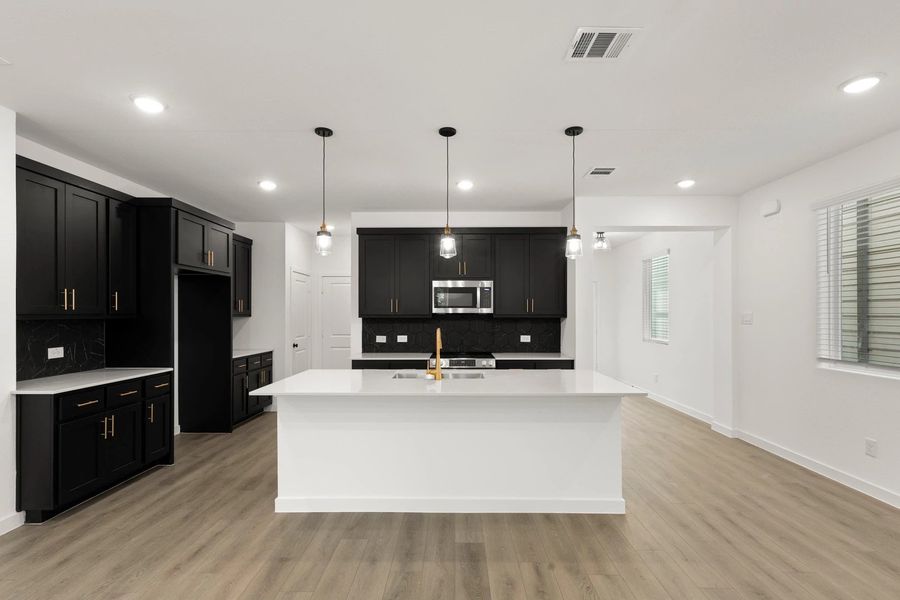 Kitchen featuring the Noir Collection Kitchen featuring the Noir Collection