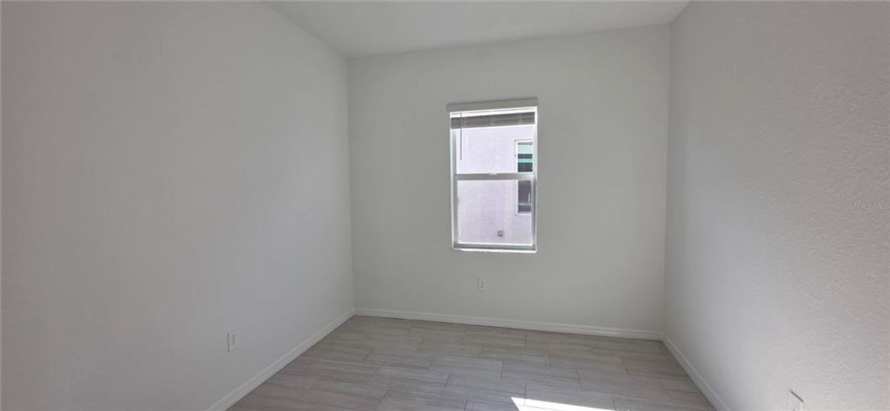 Spacious, unfurnished interior of a new home in Calusa Country Club, Lakewood Ranch (Image 11).