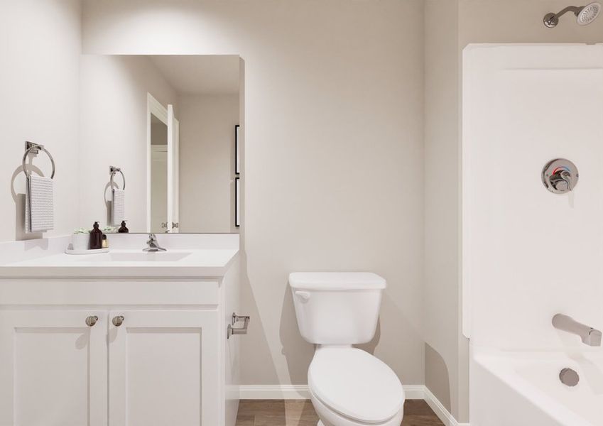 A minimalistic bathroom with light walls features a white sink with toiletries, a mirror, a toilet, and a bathtub with a showerhead, conveying a clean, serene ambiance. A minimalistic bathroom with light walls features a white sink with toiletries, a mirror, a toilet, and a bathtub with a showerhead, conveying a clean, serene ambiance.