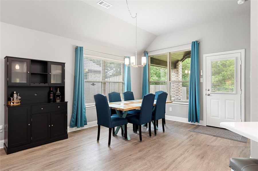 Dining area with gorgeous natural light and overlooking the back yard.