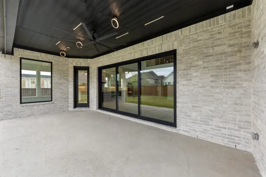 Representative exterior details of a home built from the 6051 by Tradition Homes in Mustang Lakes, McKinney (Image 3).