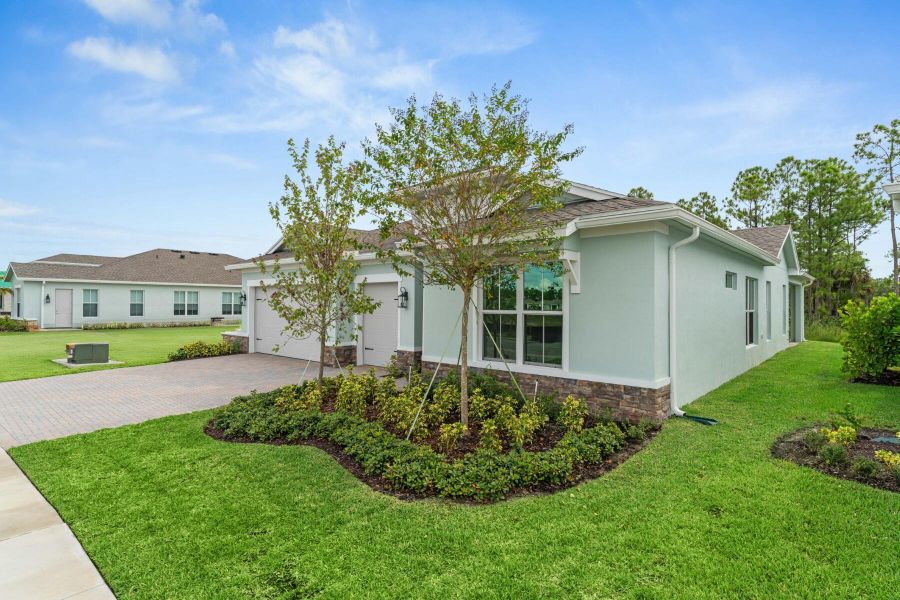 Front exterior of a new home in , Port St. Lucie, FL, highlighting curb appeal (Image 2). Front exterior of a new home in , Port St. Lucie, FL, highlighting curb appeal (Image 2).