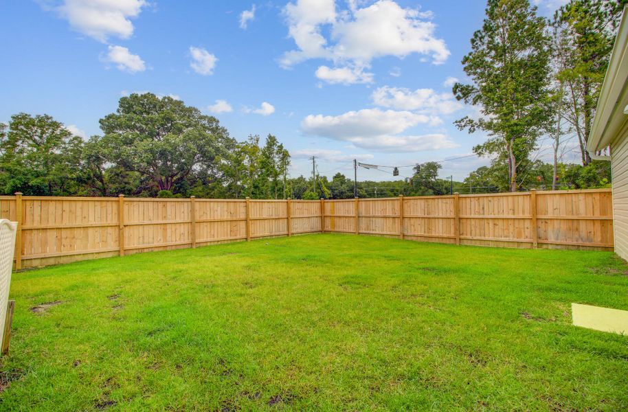 Front exterior of a new home in Limehouse Village: Row Collection, Summerville, SC, highlighting curb appeal (Image 28).