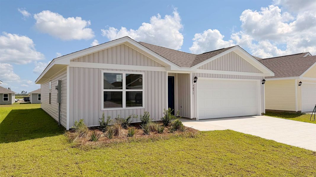Front exterior of a new home in Liberty, Panama City, FL, highlighting curb appeal (Image 2). Front exterior of a new home in Liberty, Panama City, FL, highlighting curb appeal (Image 2).