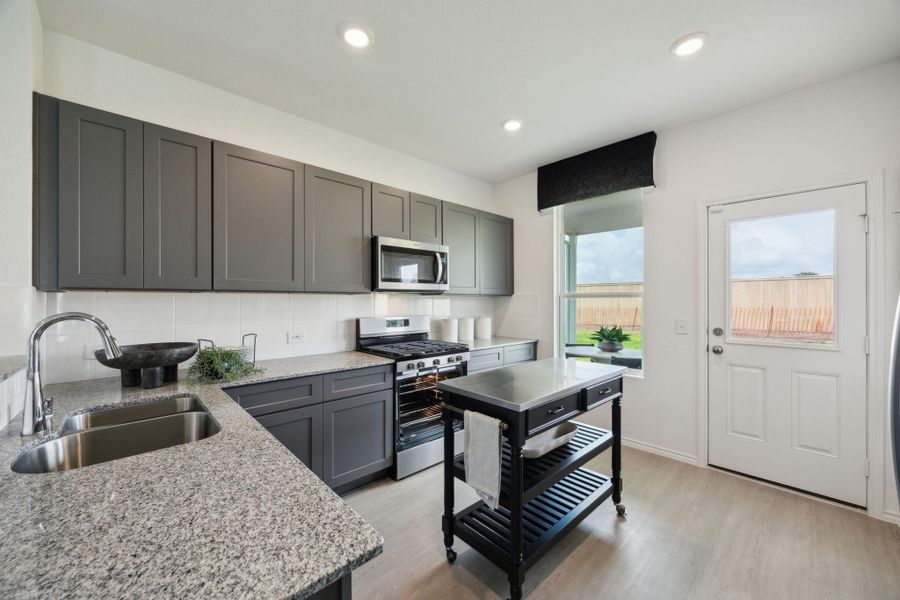 Furnished interior view inside a new home in Windcress, Cove (Image 7).