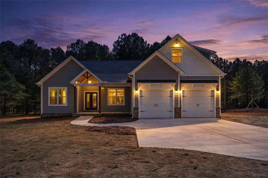 Front exterior of a new home in , Silver Creek, GA, highlighting curb appeal (Image 1). Front exterior of a new home in , Silver Creek, GA, highlighting curb appeal (Image 1).