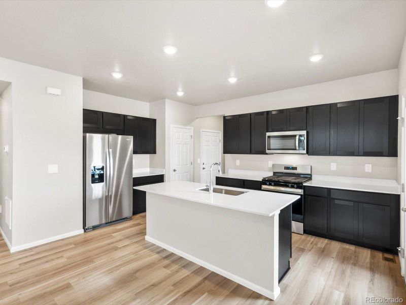 Furnished interior view inside a new home in Lake Bluff, Greeley (Image 6).