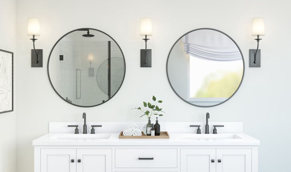 Primary bath with dual sinks and circular mirrors