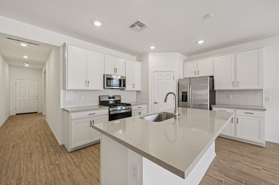 Kitchen. Finishes and options may vary by community