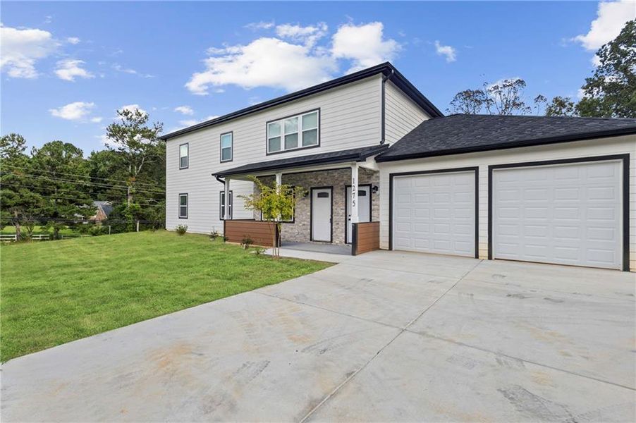 Front exterior of a new home in , Sugar Hill, GA, highlighting curb appeal (Image 18).
