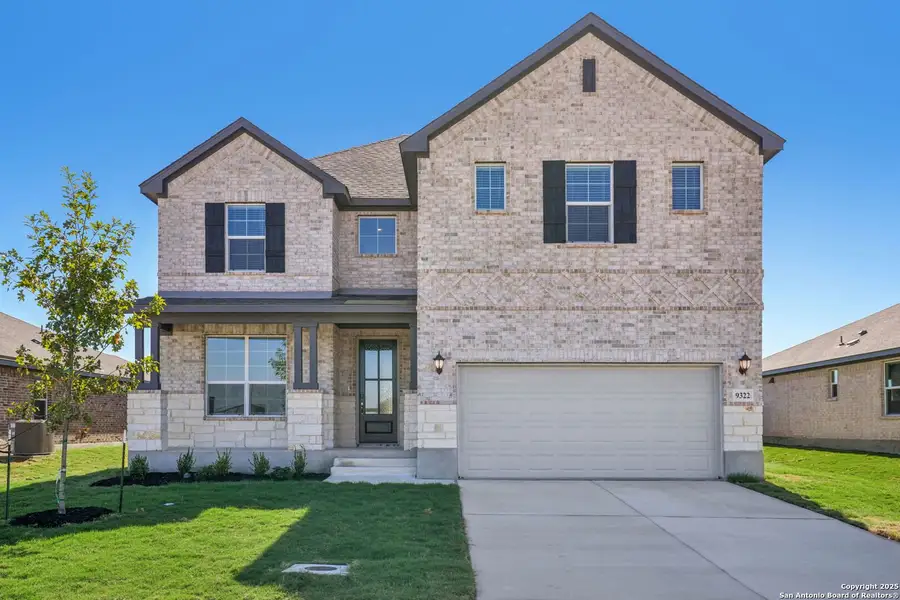 Front exterior of a new home in Carmel Ranch, Schertz, TX, highlighting curb appeal (Image 2).