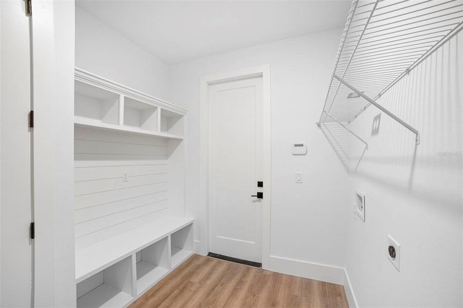 Laundry/Mudroom with custom built in storage