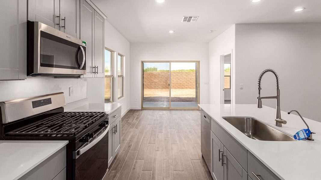 Representative furnished interior of a home built from the Baxter by D.R. Horton in The Oasis at Rocking K, Vail (Image 6).