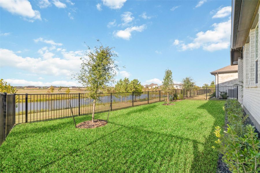 Exterior details and patio area of a home in Bridgeland 45's, Cypress (Image 22).