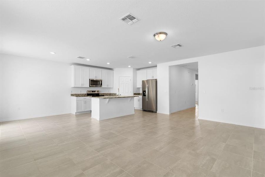 Spacious, unfurnished interior of a new home in Lawson Dunes - Signature Series, Haines City (Image 19).